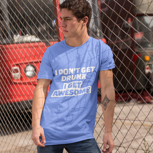 Man wearing a blue t-shirt with text standing in front of a red vehicle.