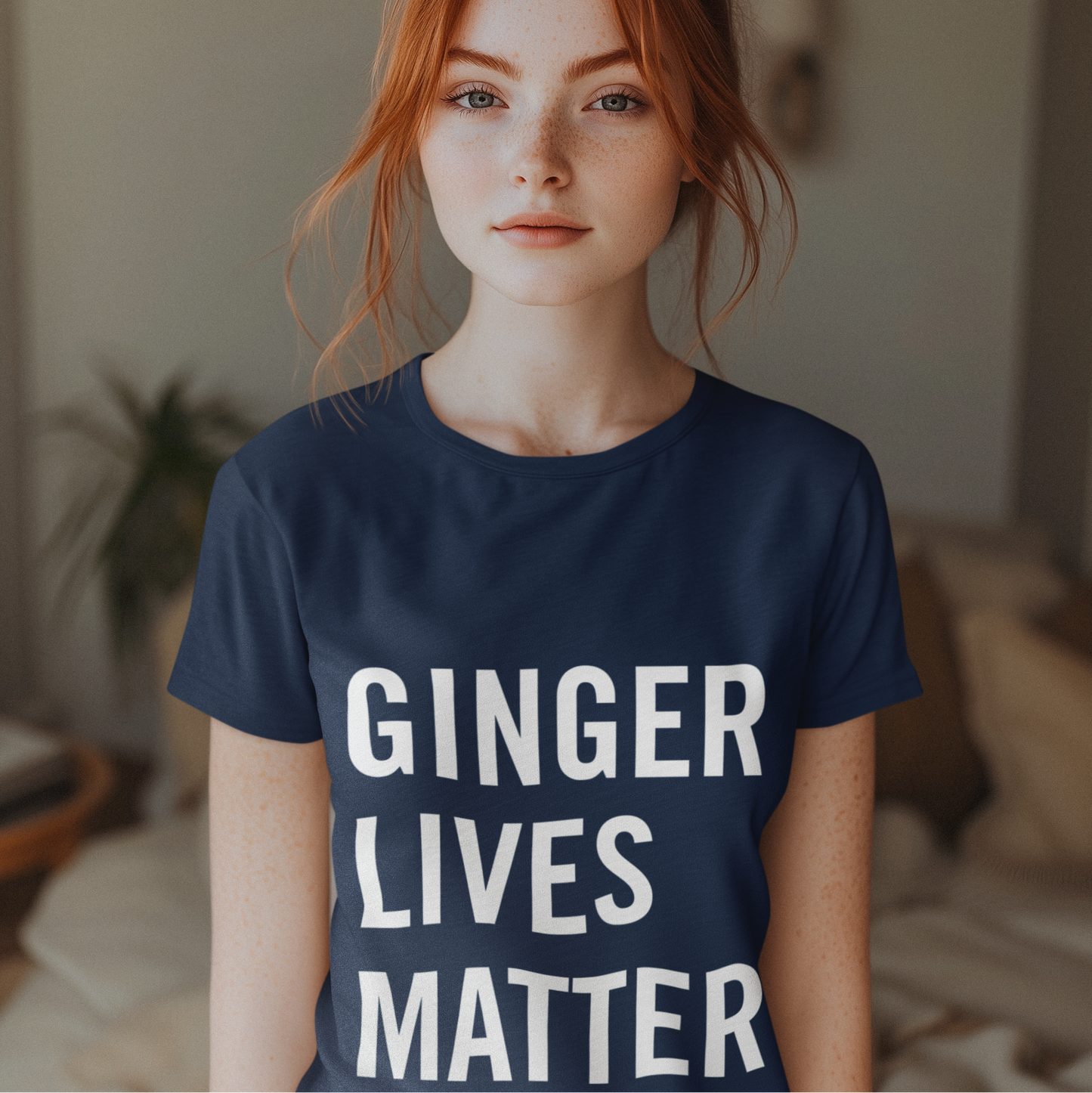 Person wearing a navy blue t-shirt with 'GINGER LIVES MATTER' text.